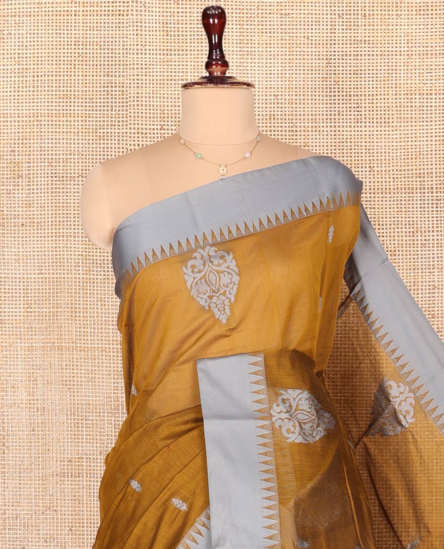 Mustard Semi-Silk Cotton Saree, Woven with Buttas on Its Body, Complemented by Contrast Temple Border, Pallu Steeped with Stripes Designs, and Paired with a Matching Blouse