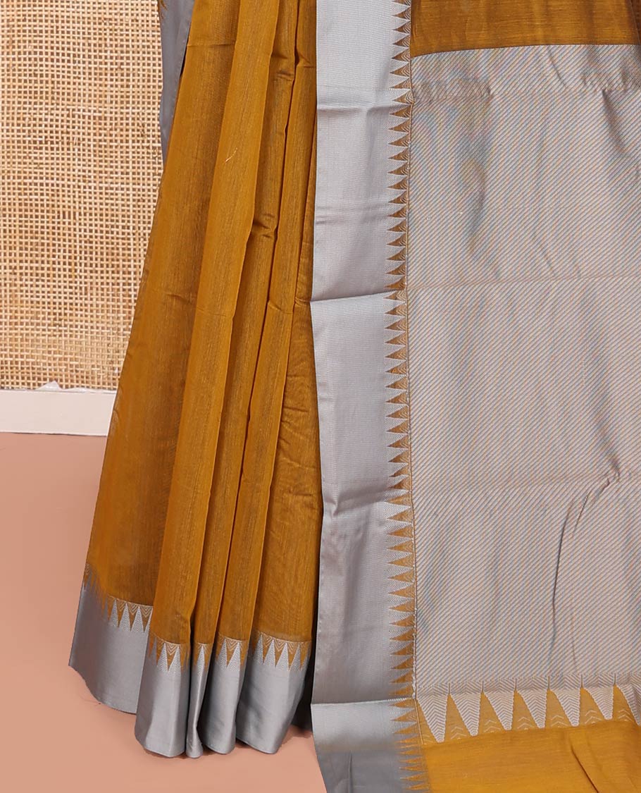 Mustard Semi-Silk Cotton Saree, Woven with Buttas on Its Body, Complemented by Contrast Temple Border, Pallu Steeped with Stripes Designs, and Paired with a Matching Blouse