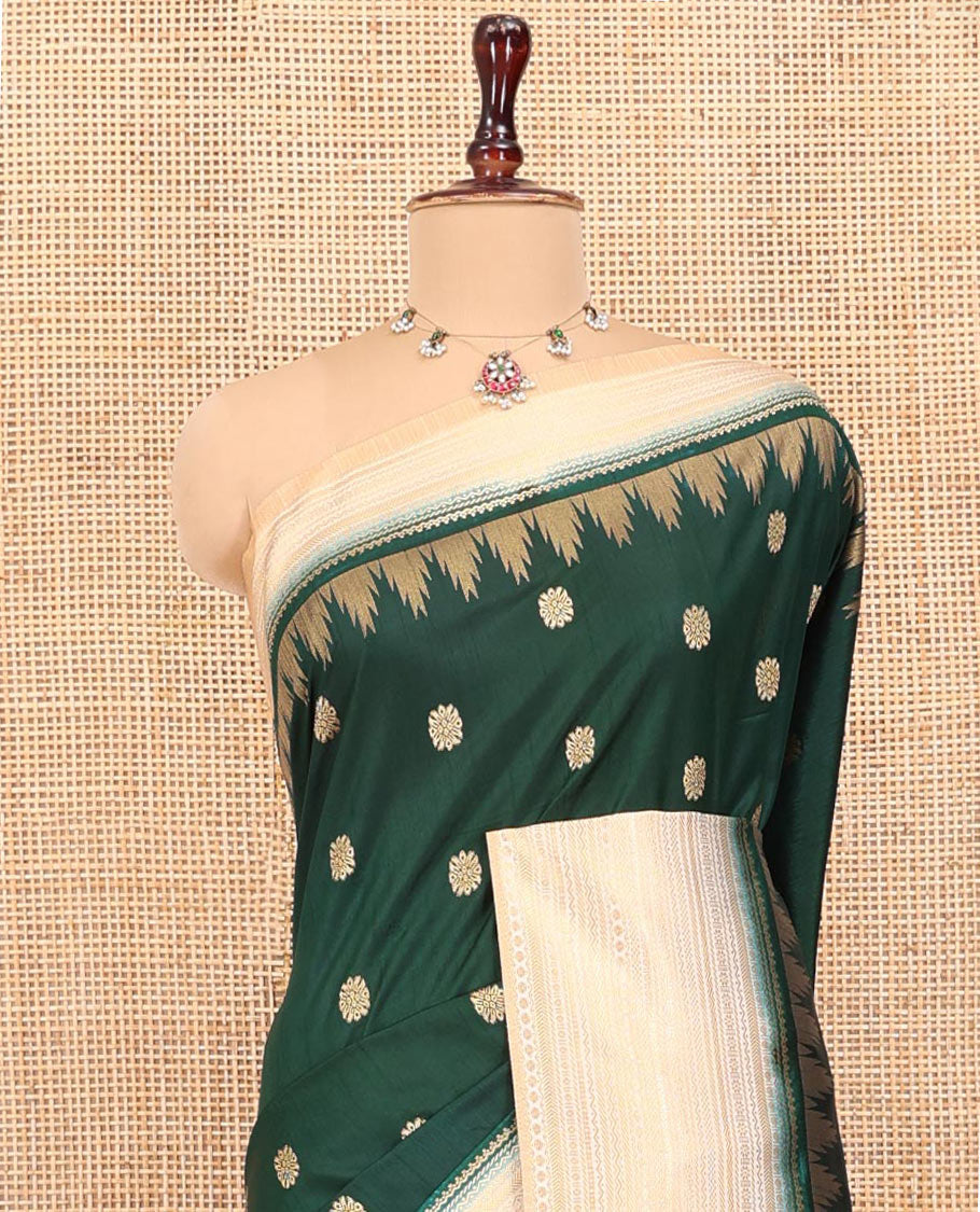 Bottle Green Dupion Silk Saree, Elevated with Zari Buttas All Over Its Body, Complemented by a Contrast Temple Traditional Zari Design Woven Border, Traditional Pallu of Temple Designs, and Paired with a Contrast Blouse
