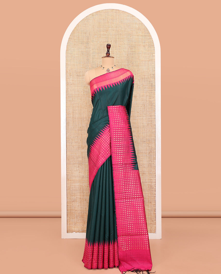 Green Plain Dupion Saree, Complemented by a Contrast Temple Border of Zari Buttas, Pallu Steeped with Buttas, and Paired with a Contrast Blouse