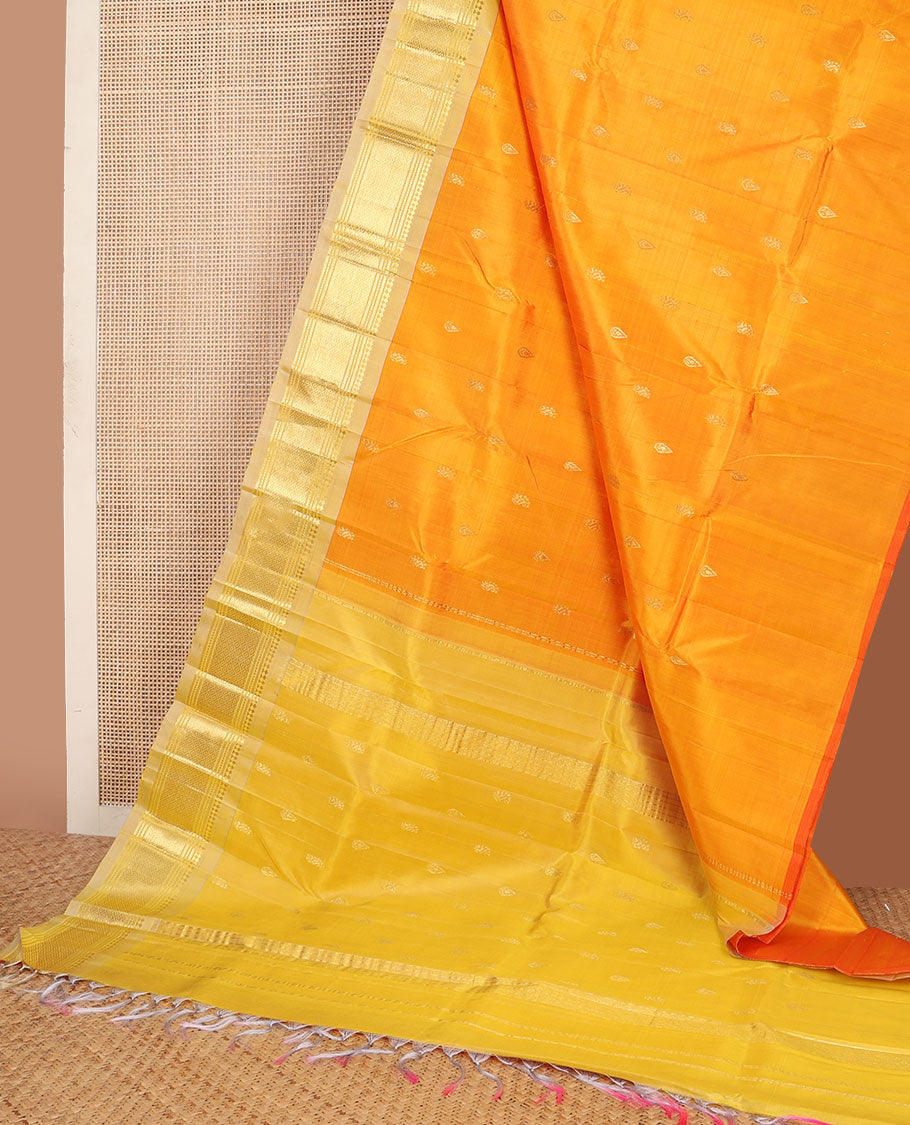 Yellow zari buttas kanchipuram silksaree, contrast one-sided border of paneer sombu,banaras,muthu & mayil kann & zari design pallu