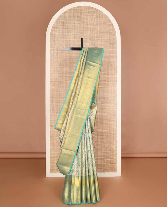 Blue jacquard tissue silk saree, zari-enriched jaal pallu & zari border of traditional zari designs