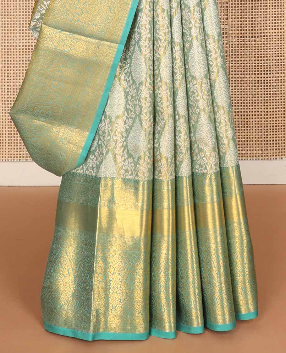 Blue jacquard tissue silk saree, zari-enriched jaal pallu & zari border of traditional zari designs
