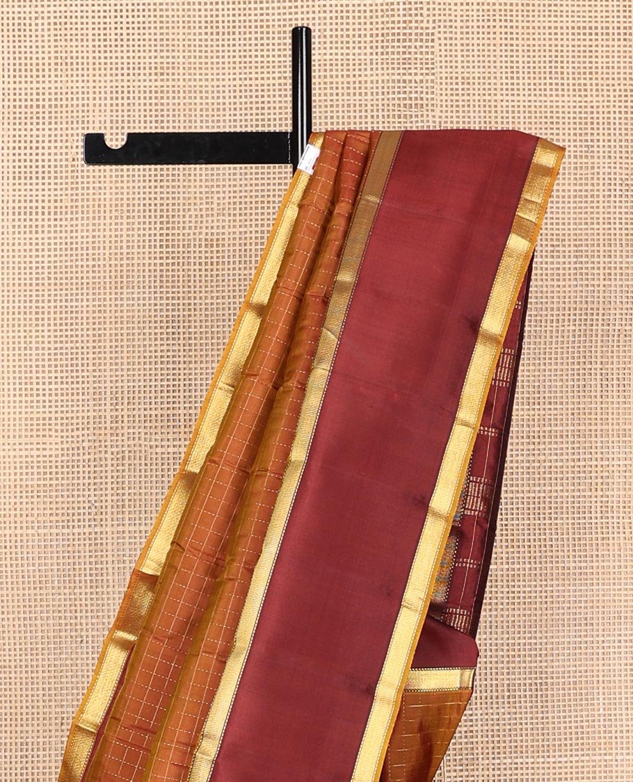 Honey color muthu kattam Kanchipuram silk saree, contrast rettai pettu border of muthu designs, and zari design pallu