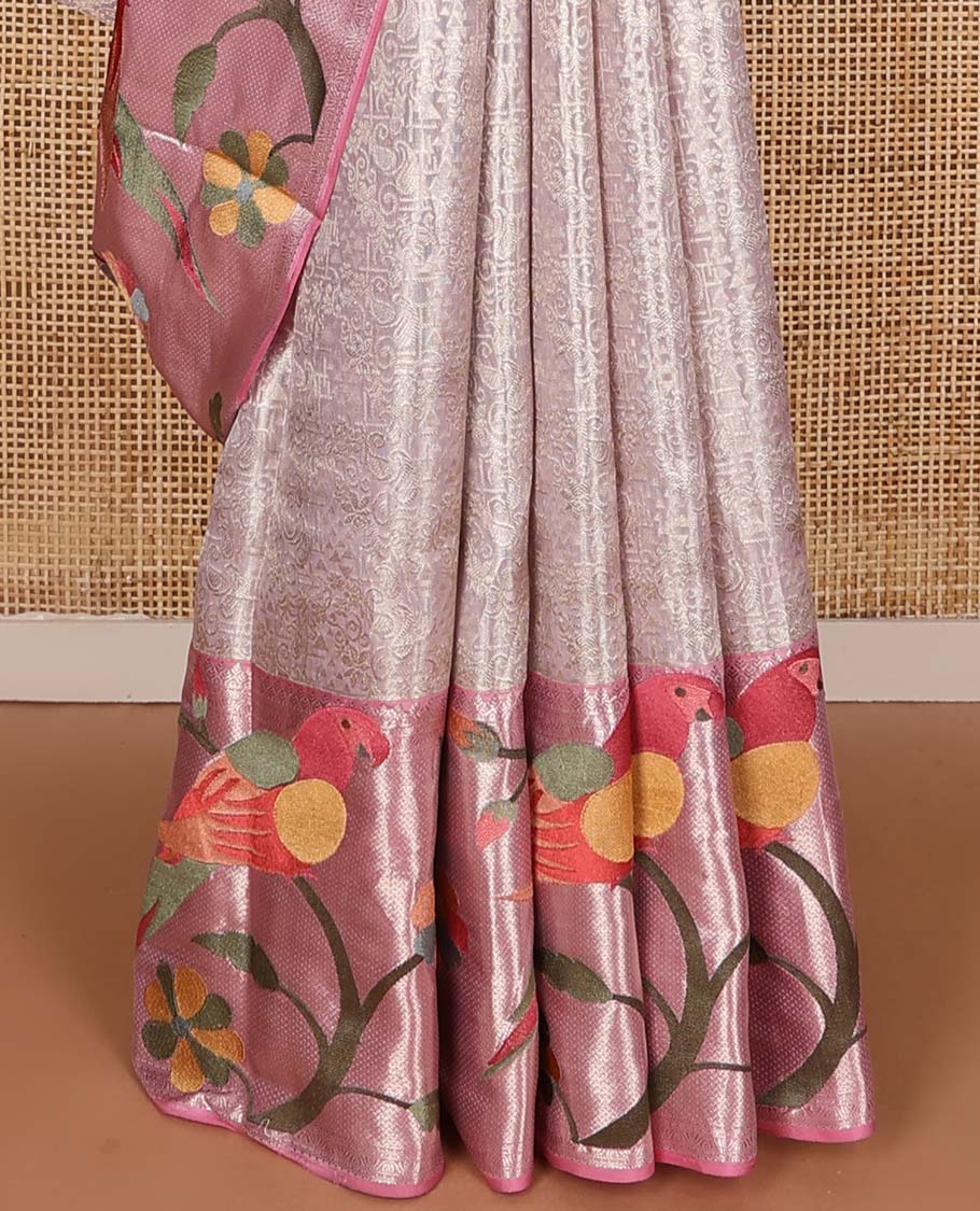 Baby pink jacquard Kanchipuram silk saree, contrast traditional with meenakari paithani floral, and macaw motifs embroidered border, and jaal pallu