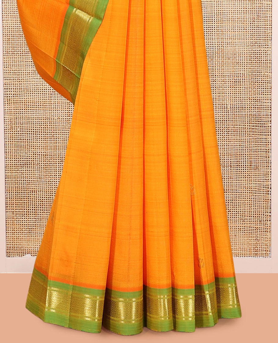 Orange Kanchipuram Silk Saree Featuring Zari Buttas, Complemented by a Contrast Border of Banaras and Mayil Kann Design, Pallu of Zari Design, and No Blouse