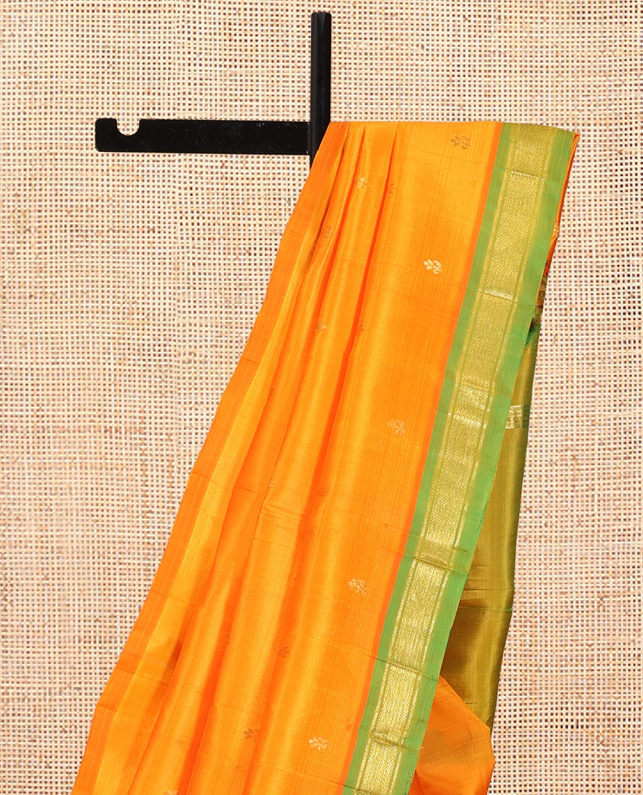 Orange Kanchipuram Silk Saree Featuring Zari Buttas, Complemented by a Contrast Border of Banaras and Mayil Kann Design, Pallu of Zari Design, and No Blouse
