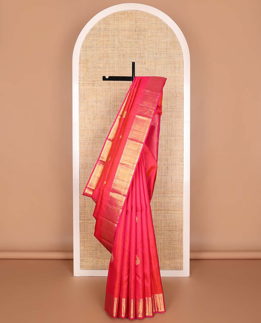 Red floral design silk saree with contrast border of thilakam mokku, muthu, manga, poo chakram design & floral design pallu