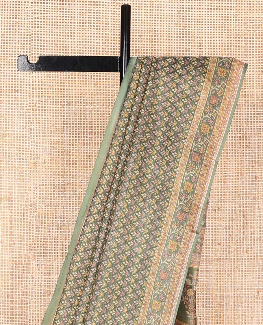 Green leaf design printed silk saree with contrast intricate design border & floral design pallu