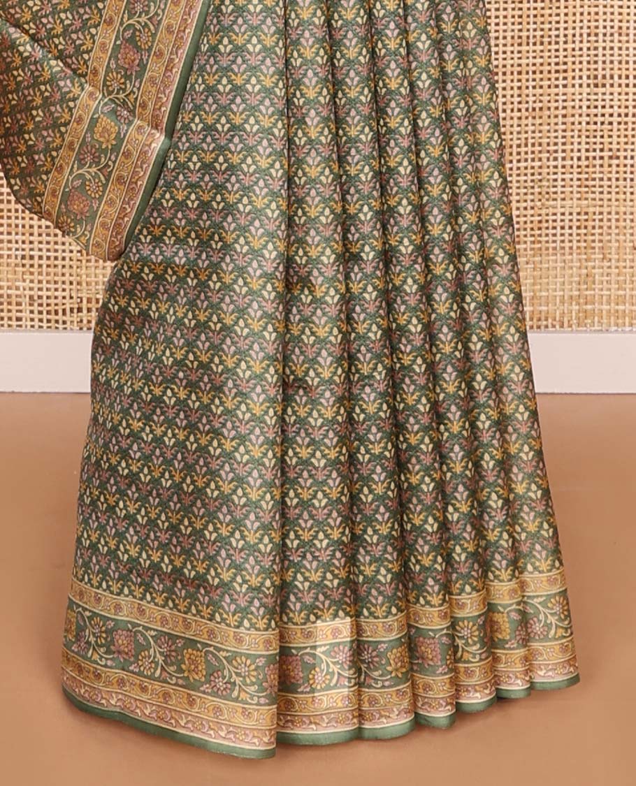 Green leaf design printed silk saree with contrast intricate design border & floral design pallu