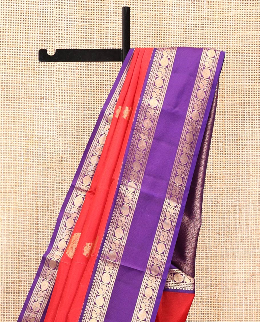 Red Vasundhara Lite Silk Mix Saree, Steeped in Richness of Zari Buttas All Over Its Body, Complemented by a Contrast Rettai Pettu Border of Salngai, Neli, Poun, and Mayil Designs, Grand Pallu, and Paired with a Contrast Blouse