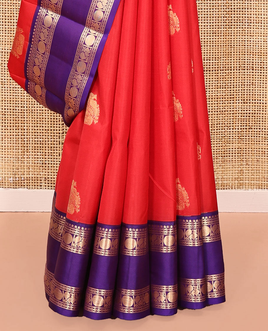 Red Vasundhara Lite Silk Mix Saree, Steeped in Richness of Zari Buttas All Over Its Body, Complemented by a Contrast Rettai Pettu Border of Salngai, Neli, Poun, and Mayil Designs, Grand Pallu, and Paired with a Contrast Blouse