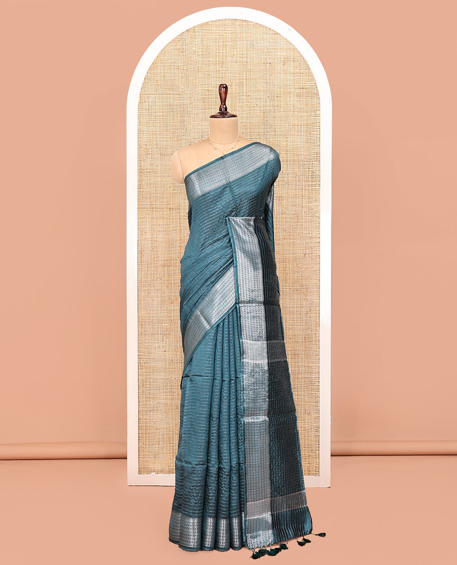 Blue Banana Pith Saree, Detailed with Zari Stripes All Over Its Body, Highlighted by Temple Border of Jaal Designs, Subtly Striped Pallu, and Paired with a Matching Blouse