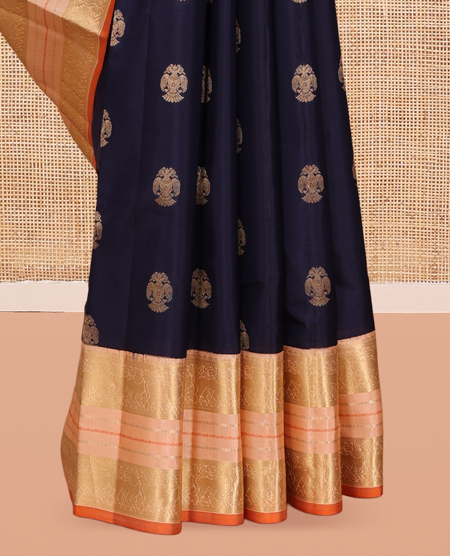 Blue Vasundhara Silk Saree, Woven with Iruthalai Pakshi Buttas, a Contrast Border of Yaali Designs, a Subtly Sparkled Jaal Pallu, and a Contrast Blouse