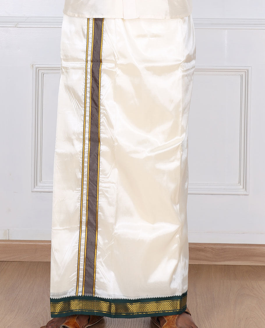 Cream art silk dhoti with contrast green zari border