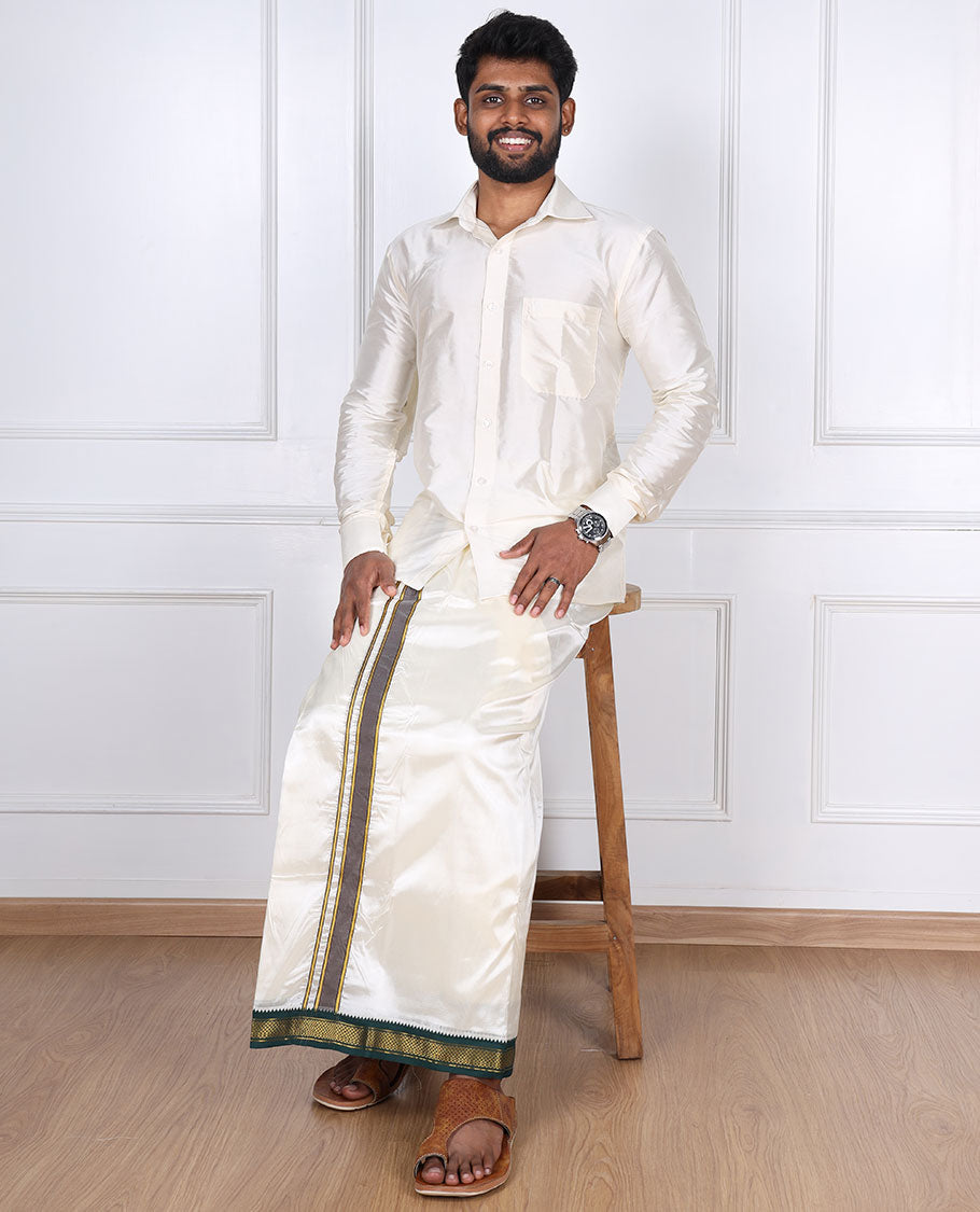 Cream art silk dhoti with contrast green zari border
