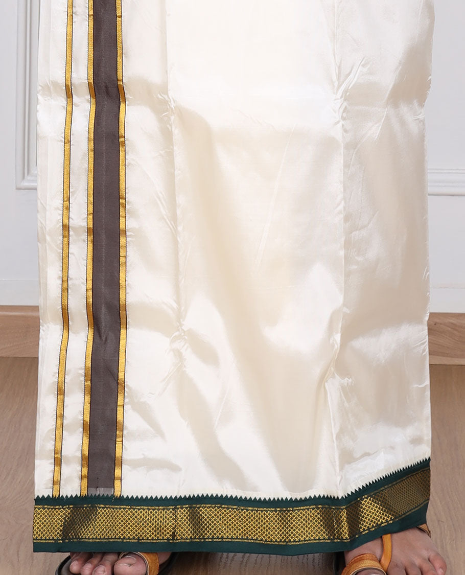 Cream art silk double-layer dhoti with contrast green gold zari border