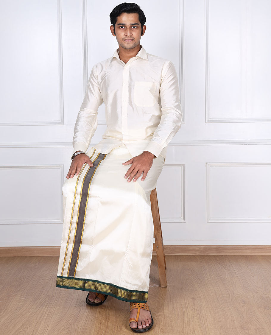 Cream art silk double-layer dhoti with contrast green gold zari border