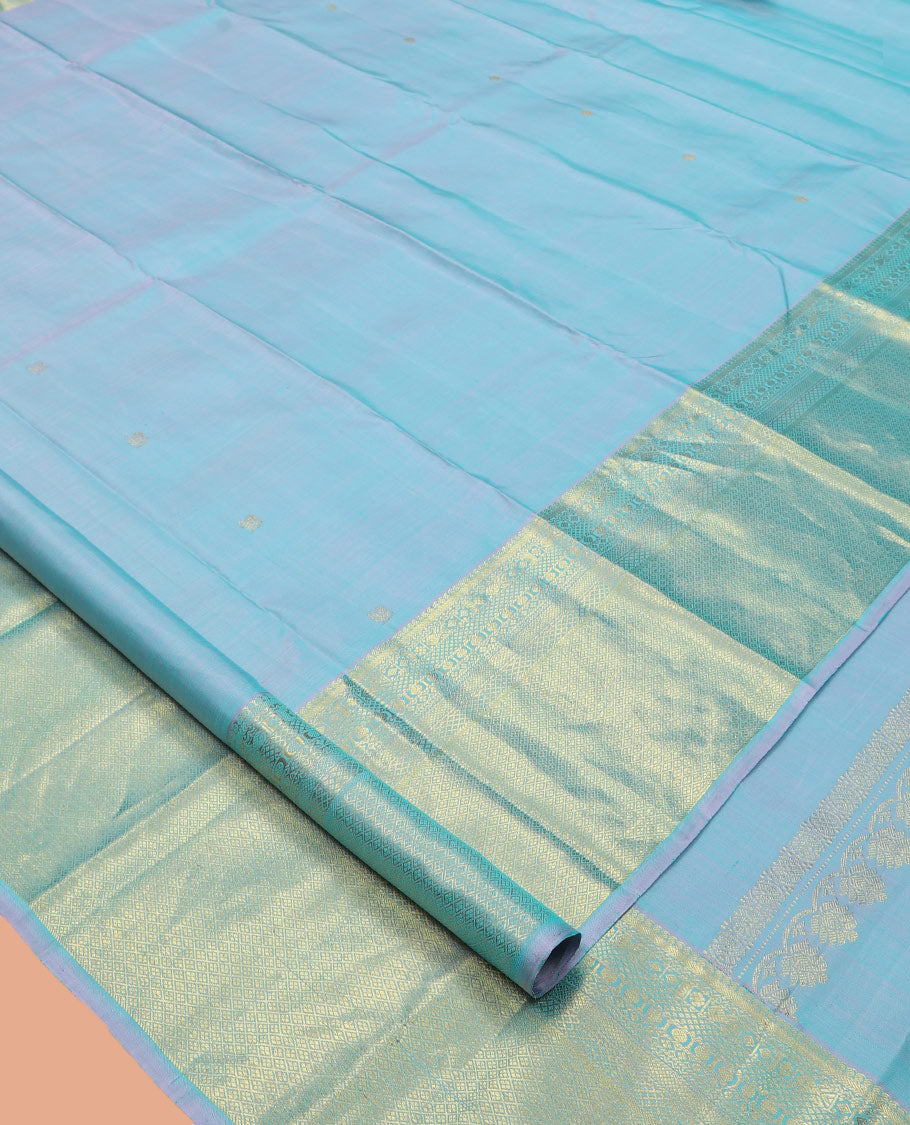 Blue Kanchipuram Silk Saree, Sparsely Woven with Zari Buttas, Highlighted by Zari Border of Manga, Neli, Mayil Kann, Kamalam, Poun, and Jaal Design, Zari Design Pallu, and a Matching Blouse