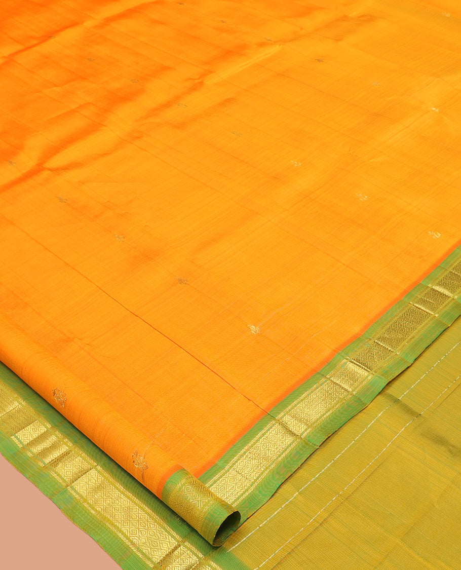 Orange Kanchipuram Silk Saree Featuring Zari Buttas, Complemented by a Contrast Border of Banaras and Mayil Kann Design, Pallu of Zari Design, and No Blouse