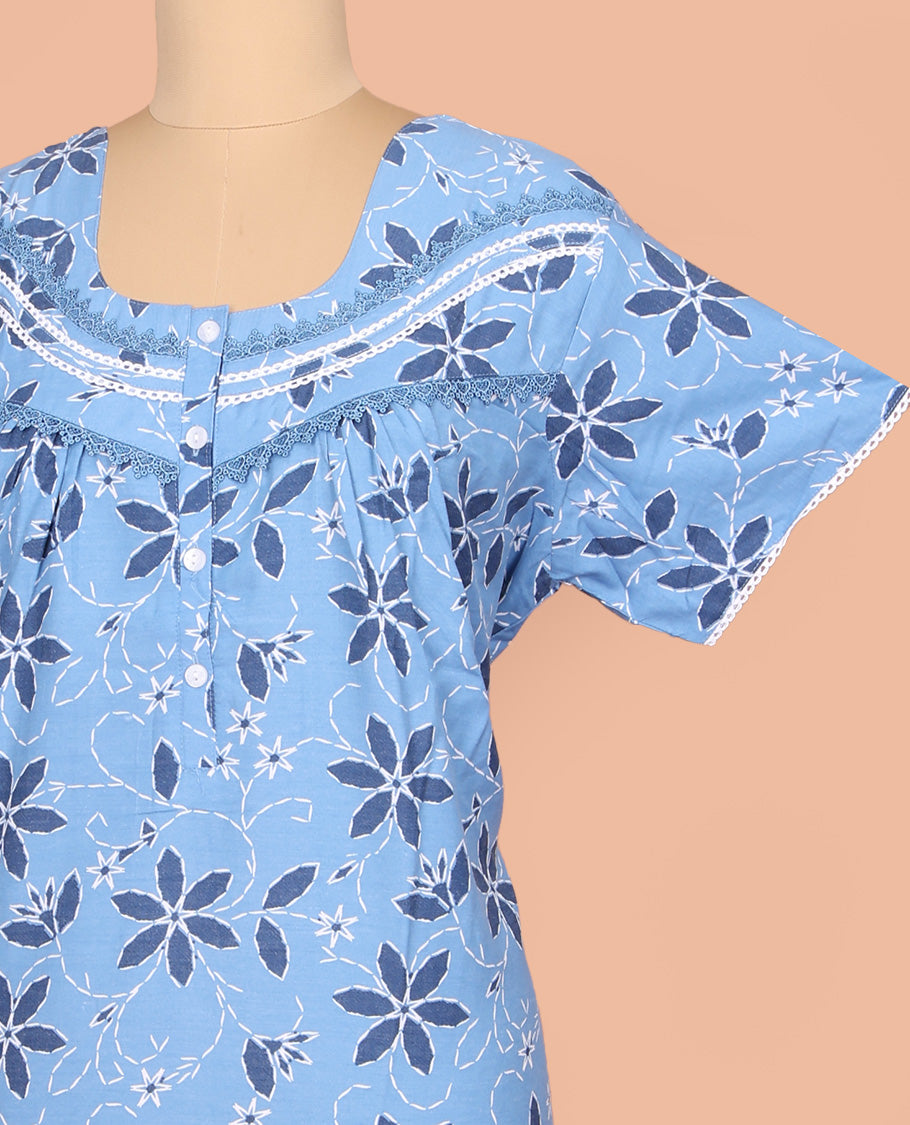 Blue Cotton Nighty Adorned with Floral Print, Featuring Lace Work, Round Front Neck, and Half Sleeves