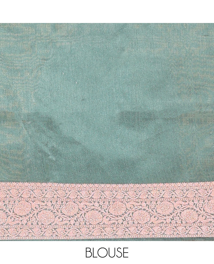 Green buttas dupion saree, floral creeper zari design border, and plain pallu flanked by floral creeper designs