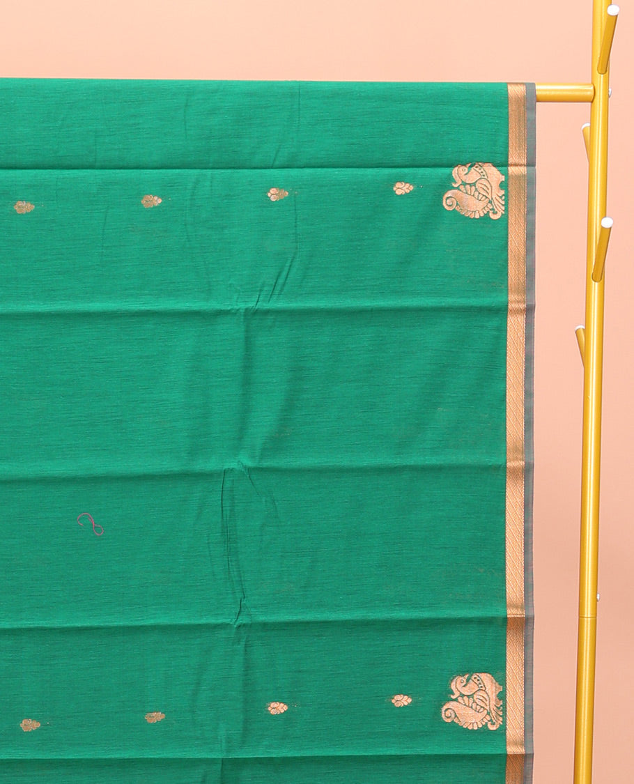 Green Semi-Silk Cotton Saree, Beautified with Buttas and Peacock Buttas All Over Its Body, a Subtle Zari Piping Border, Pallu of Peacock Butta Enclosed Checked Design, and Paired with a Contrast Blouse