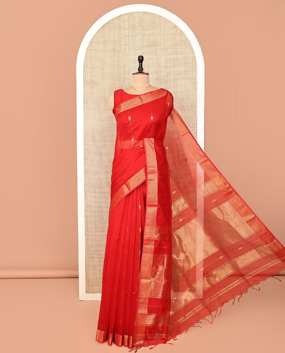 Red Maheshwari Cotton Saree, Accentuated with Diamond Stripes on Its Body, Highlighted by Zari Border of Chevron Designs, Gleaming Pallu Steeped with Zari Stripes, and Paired with a Matching Blouse