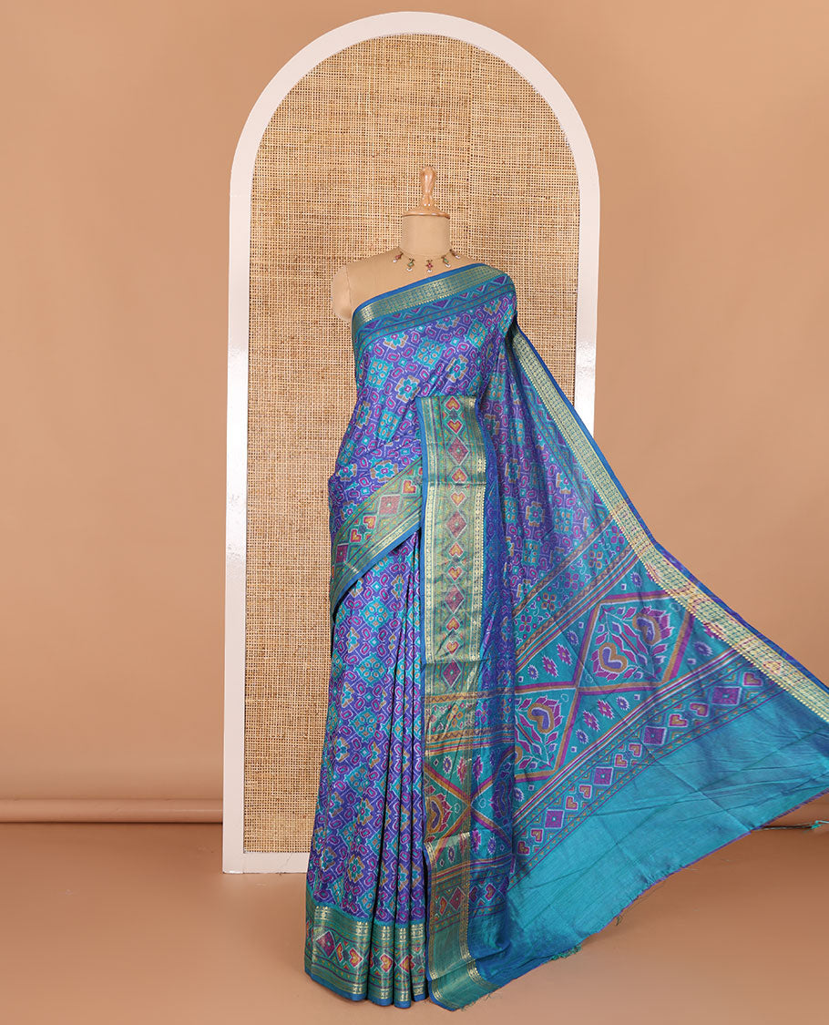 Blue intricate design patola saree, contrast traditional zari and double-ikkat style border, printed pallu, and blouse of print, and zari work