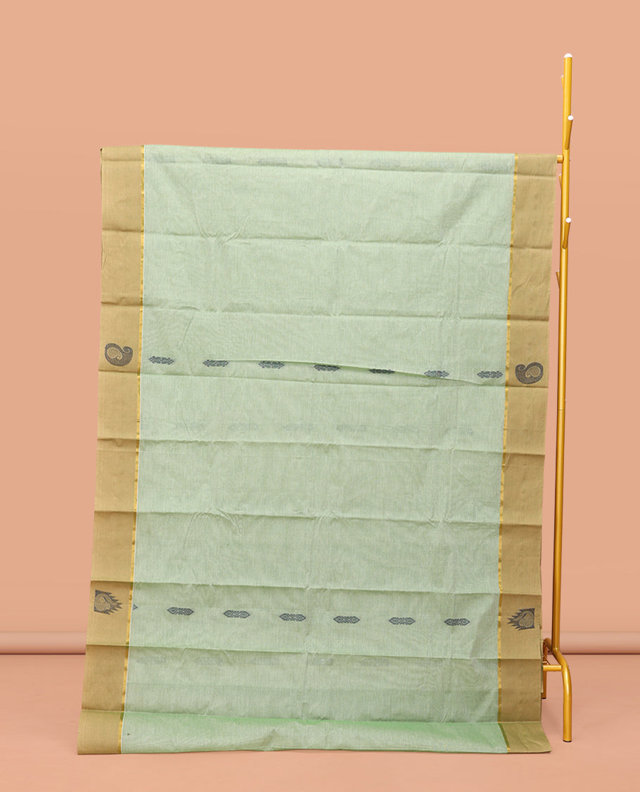 Green Kanchi Cotton Saree Features Buttas on Its Body, Contrast Temple and Paisley Border, Intricately Designed Pallu, and a Matching Blouse