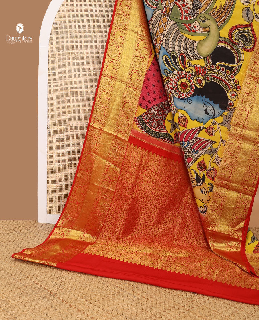 Yellow pichwai theme, peacock design kalamkari silk saree with contrast intricate zari design border & floral jaal design pallu