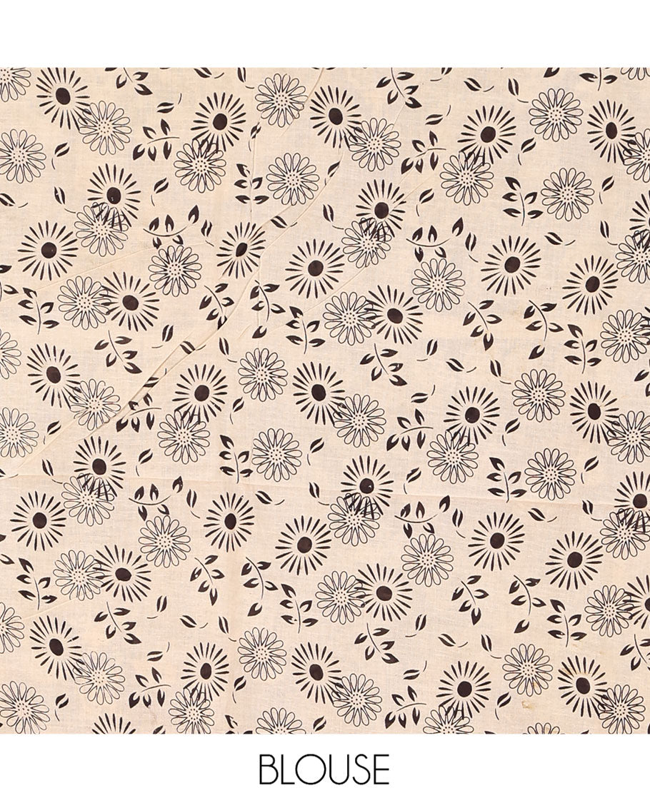 Grey Machine-Printed Kalamkari Cotton Saree, Ornamented with Batik Print on Its Body, Subtle Self-Printed Border, Pallu of Intricate Print, and Paired with a Printed Blouse