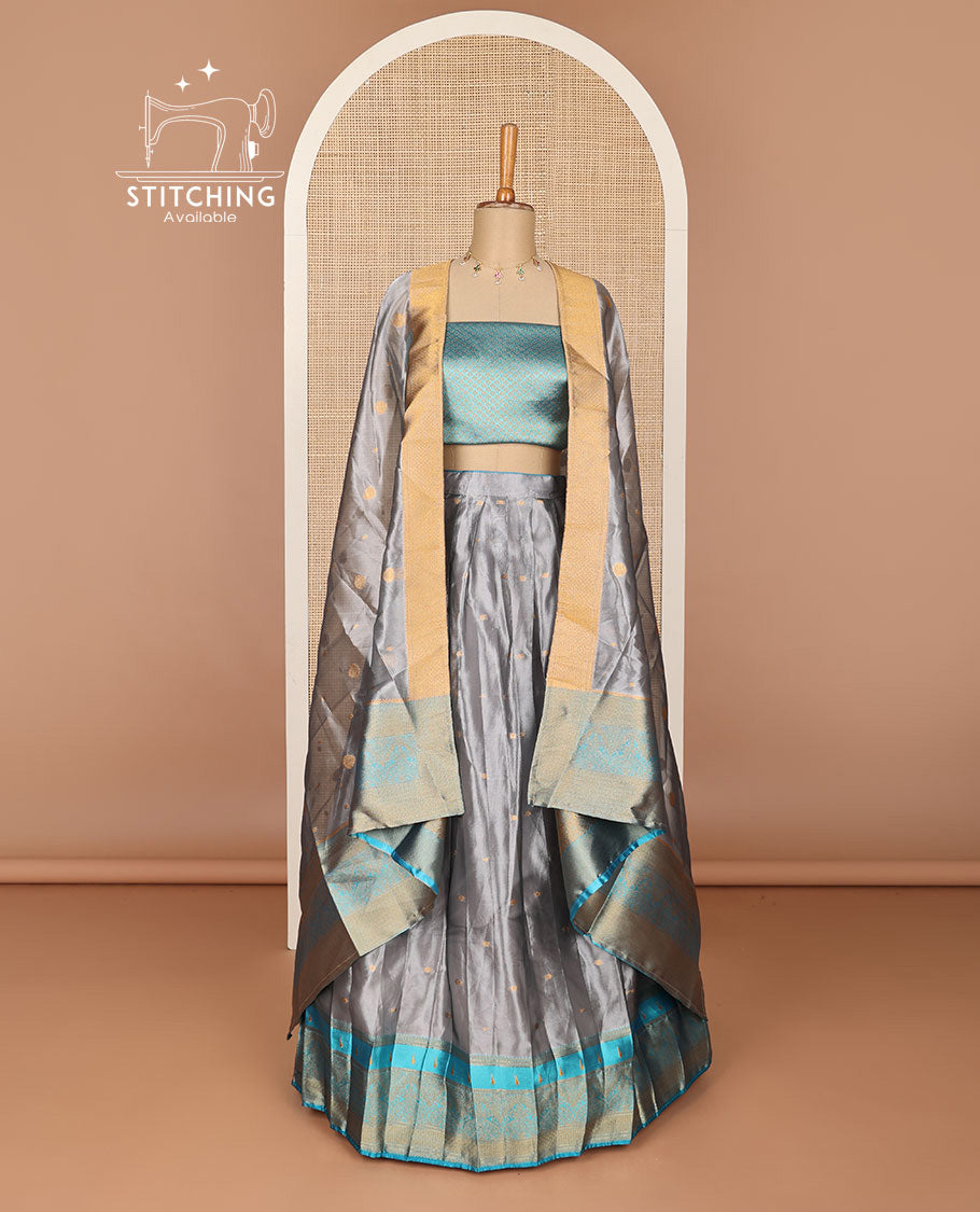 Grey floral jaal design half saree with contrast zari design border , checked zari design blouse & floral zari design dhavani
