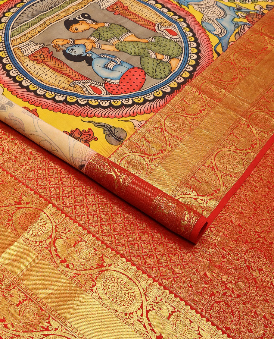 Yellow pichwai theme, peacock design kalamkari silk saree with contrast intricate zari design border & floral jaal design pallu