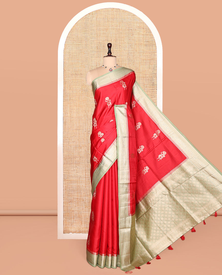 Red Satin Silk Saree, Spotlighted with Floral Buttas, Complemented by a Contrast Traditional Zari Border, Grand Jaal Pallu, and a Contrast Blouse