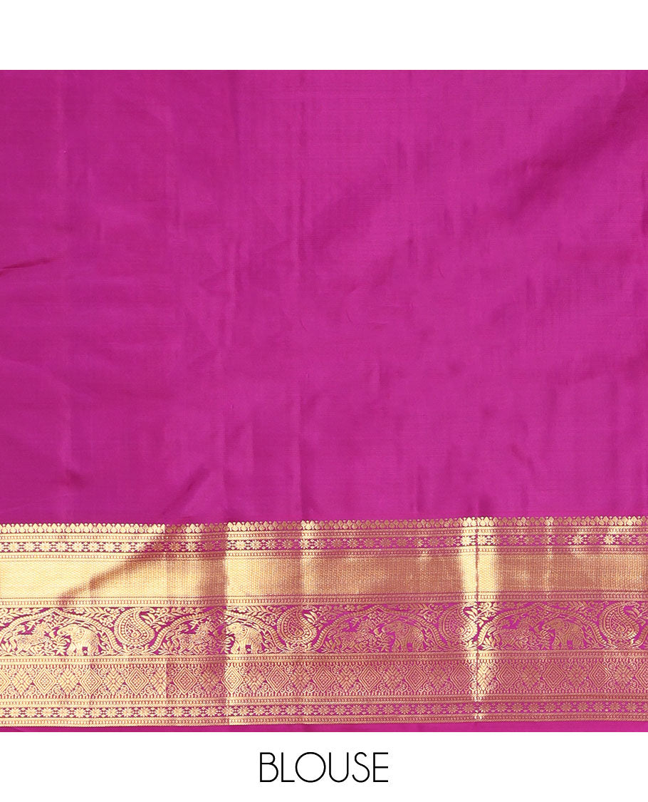 Purple Vasundhara Silk Saree, Dazzled with Zari Buttas and Zari Checks All Over Its Body, Highlighted by a Zari Border of Banaras, Muthu, Star Vanki, Manga, Kuthirai, and Yaanai Designs, Intricately Designed Pallu, and Paired with a Matching Blouse