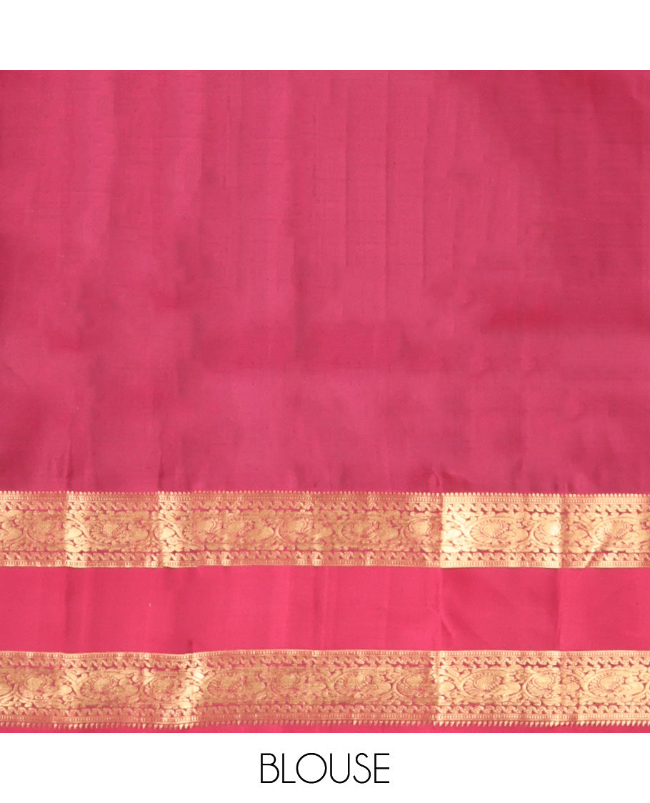 Green Zari Buttas Vasundhara Silk Saree Adorned with a Contrast Rettai Pettu Border of Rekku, Muthu, and Kodi Mayil Designs, Grand Pallu, and a Contrast Blouse