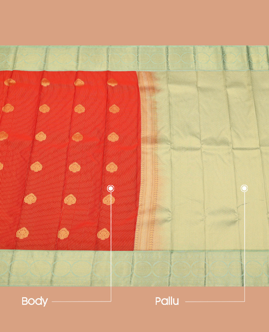 Orange Budget Silk Saree, Accentuated with Zari Buttas and Stripes on Its Body, Complemented by a Contrast Traditional Zari Chakram Design Border, Intricately Designed Pallu, and Paired with a Contrast Blouse