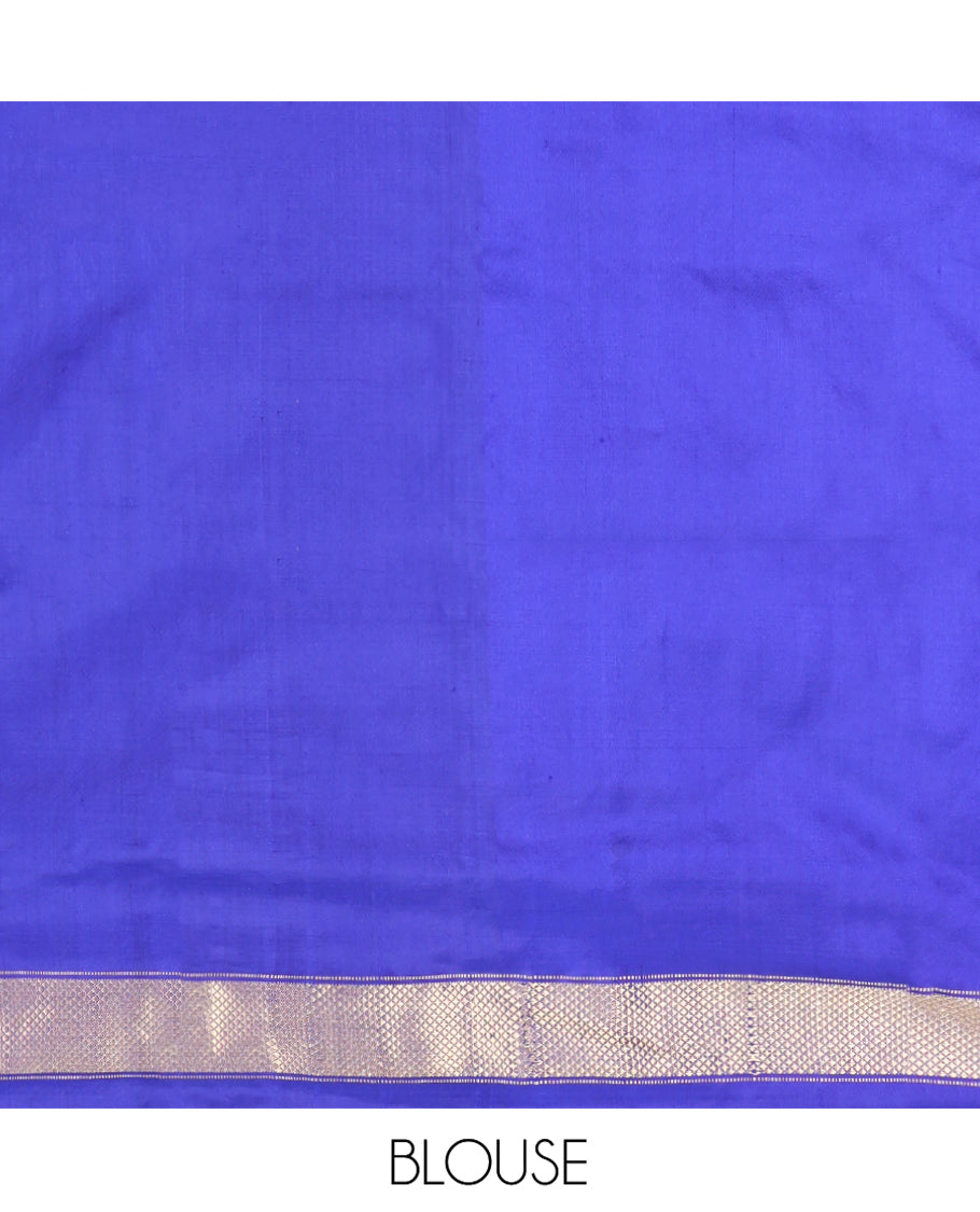 Grey Plain Ikkat Silk Saree, Complemented by a Contrast Temple Border of Diamond Designs, Pallu Features Ikkat Fauna Designs, and Paired with a Contrast Blouse
