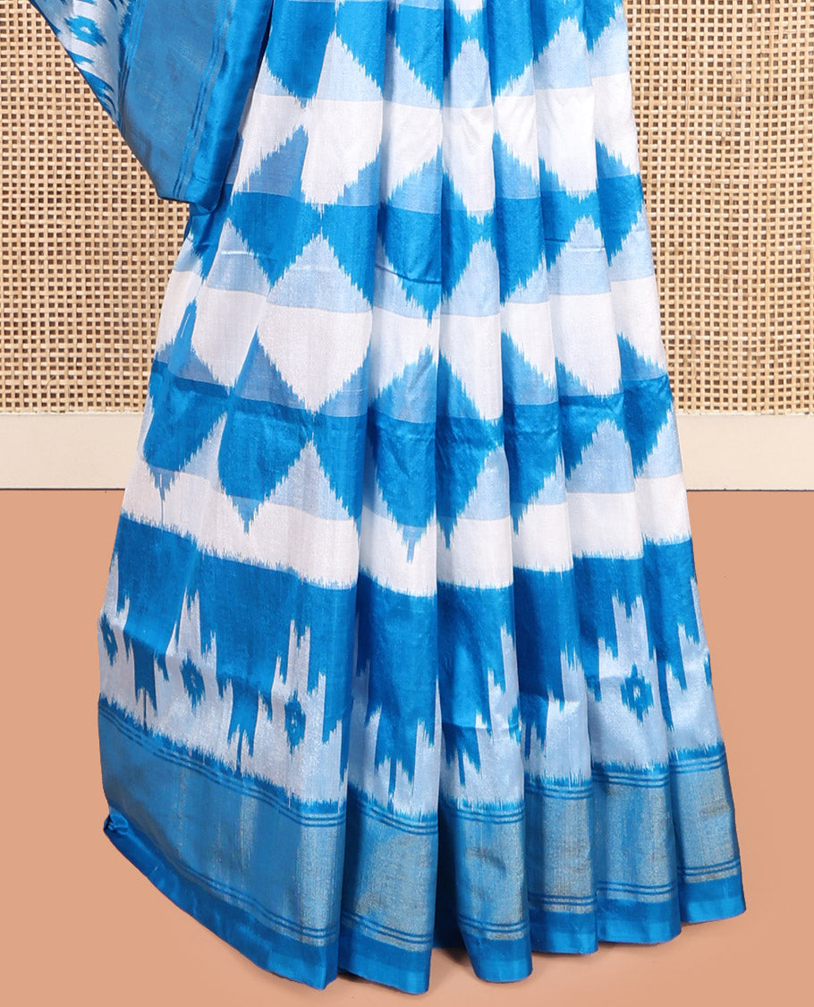 Blue Pochampally Ikat Silk Saree, Adorned with Triangle Motifs, Highlighted by a Self-Border, Ikat Jaal Pallu, and Matching Blouse