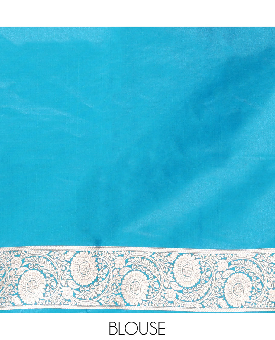 Blue Semi-Banaras Saree, Majestically Detailed with Floral Jaal Jacquard on Its Body, Highlighted by a Floral Creeper Design Border, Intricately Designed Zari Pallu, and Paired with a Matching Blouse