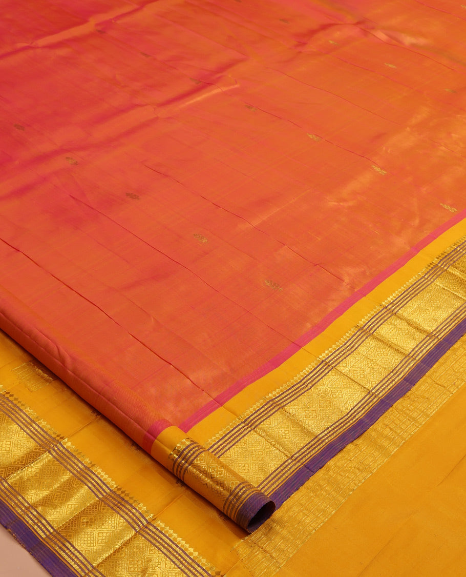 Orange Kanchipuram Silk Saree, Finely Crafted with Zari Buttas, a Contrast One-sided Border of Panner Sombu, Banaras, Muthu, and Jaal Designs, Zari Woven Pallu, and No Blouse