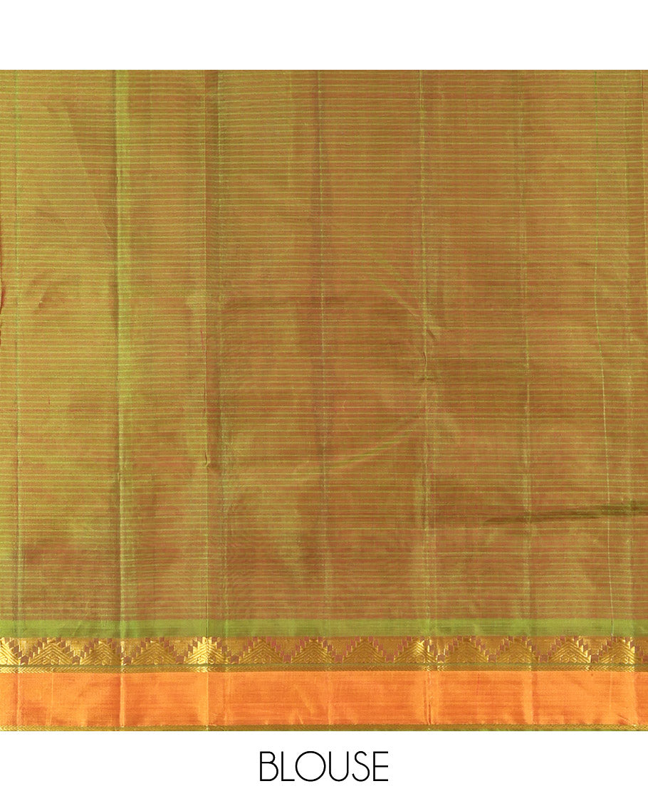 Maroon Kanchipuram Silk Saree, Sparsely Woven with Vazhaipoo Stripes and Buttas on Its Body, Complemented by Contrast Rettai Pettu Border of Thazampoo Rekku, and Kathir Designs, Zari-Striped Pallu, and Paired with a Contrast Blouse