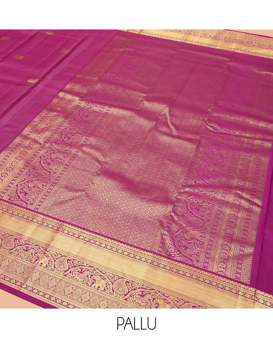 Purple Vasundhara Silk Saree, Dazzled with Zari Buttas and Zari Checks All Over Its Body, Highlighted by a Zari Border of Banaras, Muthu, Star Vanki, Manga, Kuthirai, and Yaanai Designs, Intricately Designed Pallu, and Paired with a Matching Blouse