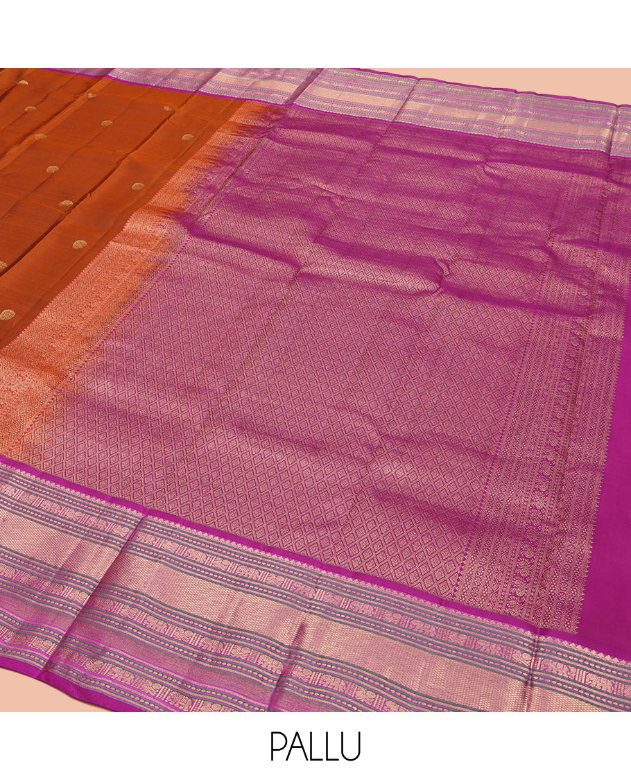 Rust Orange Vasundhara Lite Silk Mix Saree, Showcasing with Zari Buttas, Complemented by a Contrast Border of Thilakam Mokku, Banaras, Mayil, Yaanai, and Mayil Kann Designs, Artfully Detailed Pallu of Jaal Designs, and Paired with a Contrast Blouse