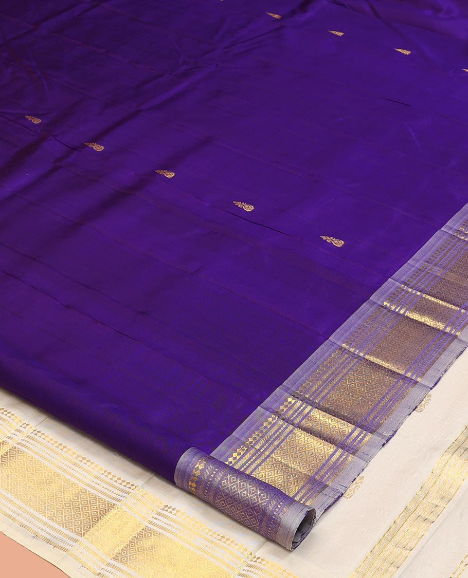 Violet Kanchipuram Silk Saree, Crafted with Zari Buttas, a One-Sided Border of Panner Sombu, Banaras, Muthu, and Mayil Kann Designs, a Zari Design Pallu, and No Blouse