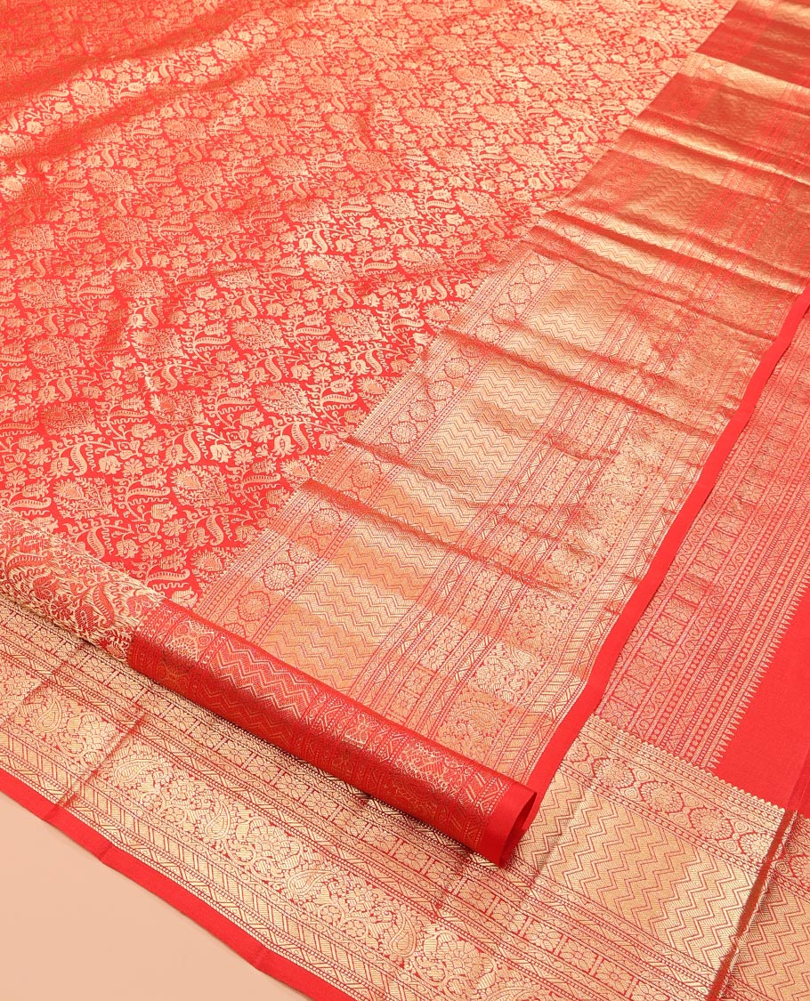 Red Kanchipuram Wedding Silk Saree, Bedecked with Jacquard Design, a Zari Border Steeped with Traditional Designs, Manga Design Pallu, and a Matching Blouse