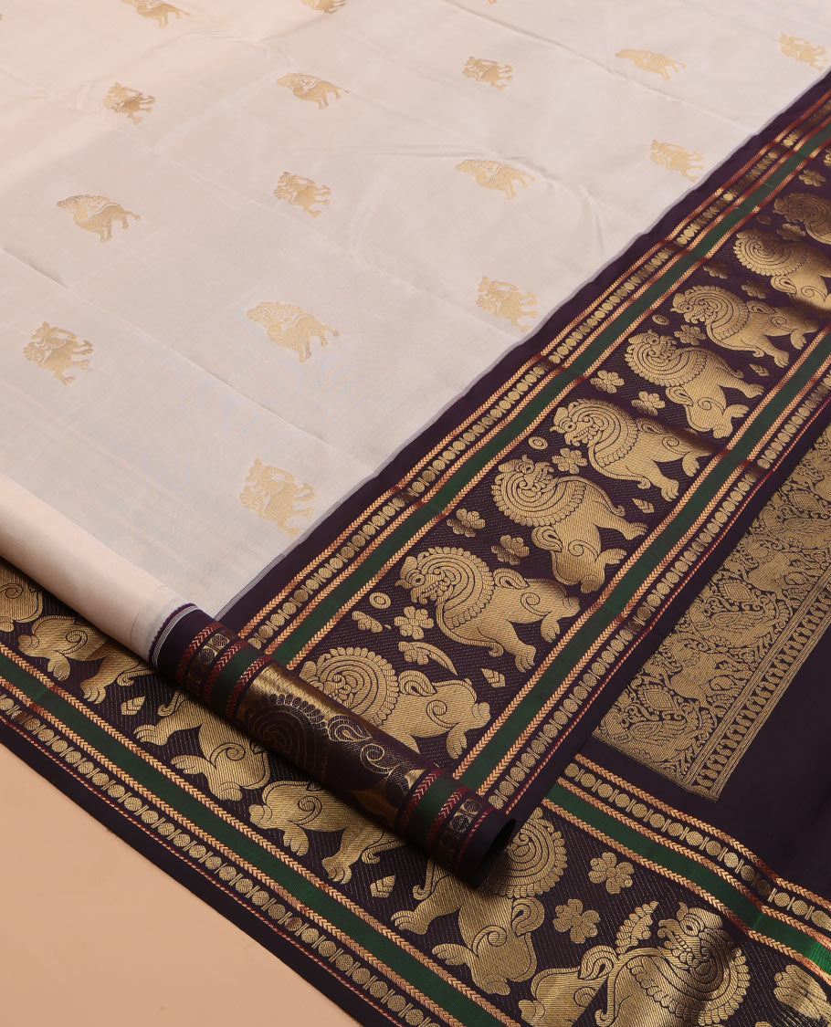 Cream Vasundhara Lite Silk Mix Saree, Woven with Yaali Buttas, a Contrast Singam Border, Grand Jaal Pallu, and a Contrast Blouse