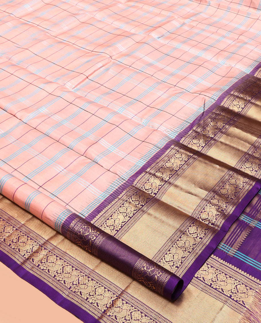 Peach Checked Kanchipuram Silk Saree, Complemented by a Contrast Traditional Border of Mayil Designs, Jaal Pallu, and a Contrast Blouse