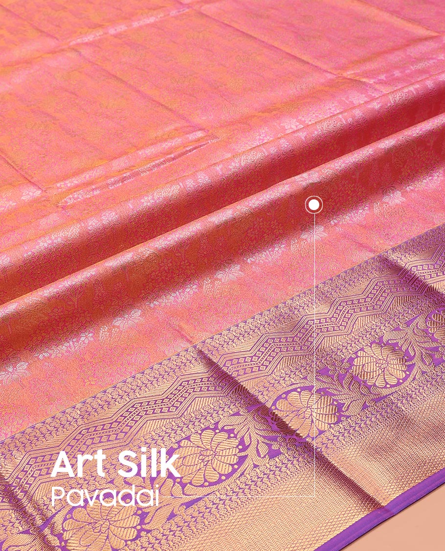 Peach Art Silk Pavadai Material Set, Masterfully Woven with Floral Jacquard on Its Skirt, Complemented by a Contrast Traditional Zari Design Border, and Paired with a Matching Blouse